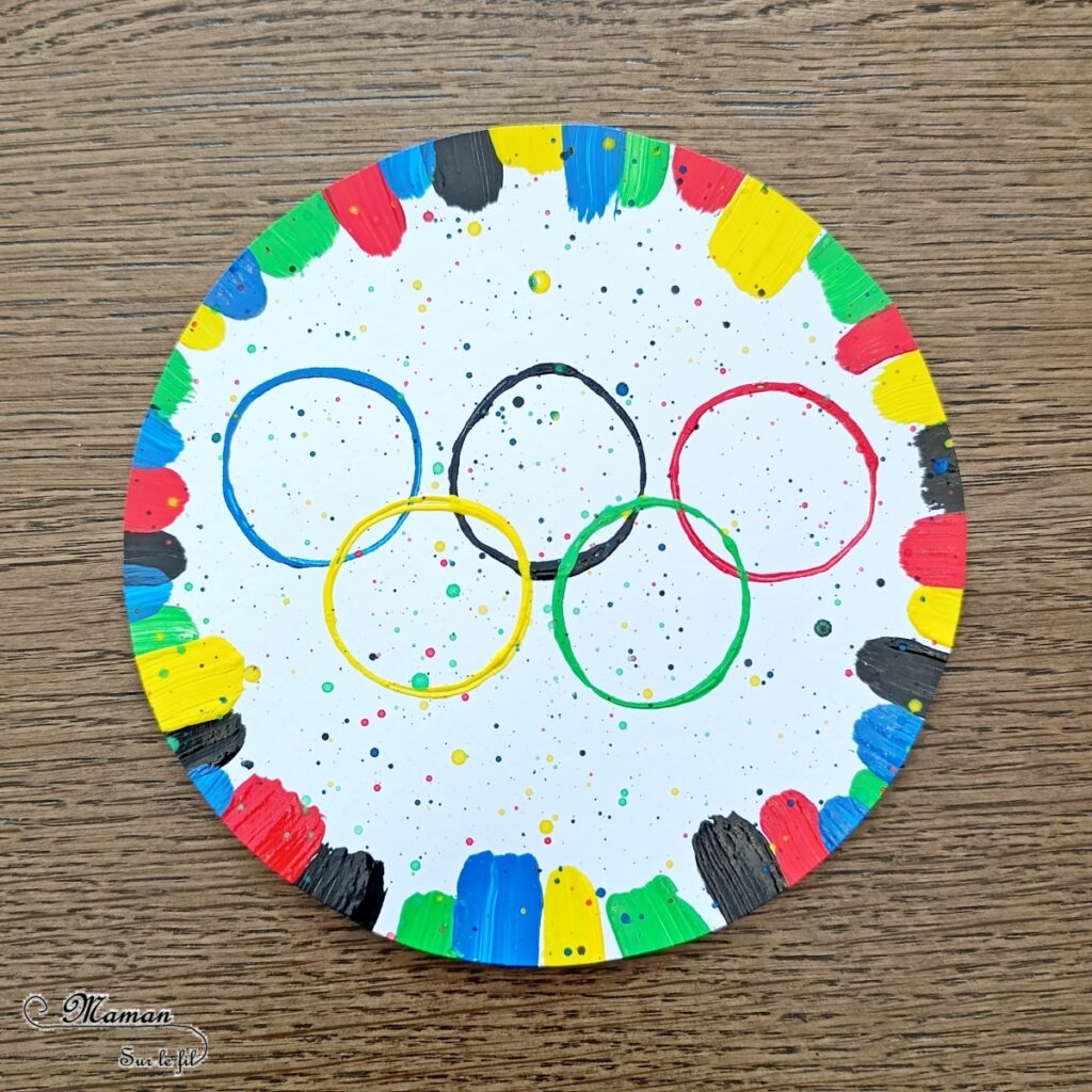 Peindre les anneaux olympiques avec un rouleau de PQ en carton : activité créative, peinture et manuelle enfants - Peinture avec des rouleaux de papier toilettes en carton et un pinceau - Peinture éclaboussée et aquarelle - Recyclage et surcyclage - Ronds, cercles, géométrie - Thème jeux olympiques, sports - Bricolage sympa et facile - Arts visuels Maternelle et cycle 2 - Arts visuels et atelier Maternelle et élémentaire - Créativité - Cycle 1 ou 2 - tutoriel photos - mslf