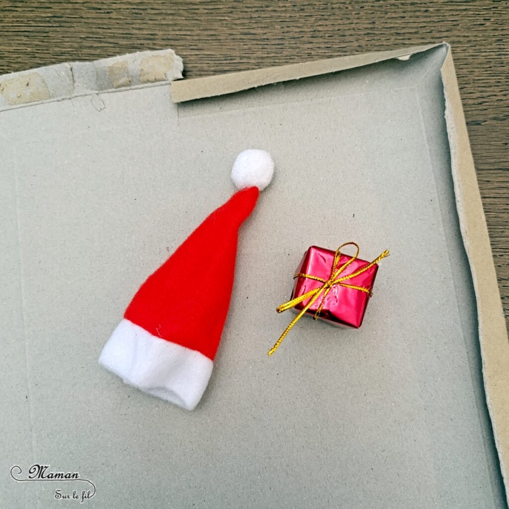 Fabriquer un bonhomme en pain d'épices en récup' avec son petit cadeau dans les bras : activité créative, récup' et manuelle enfants - Bricolage et décoration en carton - Découpage, dessin, graphismes, bonnet de Noël - Suspension DIY pour le sapin -Fait Maison - Thème Noël, hiver, gourmandises - Bricolage et décoration sympa et facile - Arts visuels Maternelle et cycle 2 - Maternelle et élémentaire - Créativité - Cycle 1 ou 2 - tutoriel photos - mslf