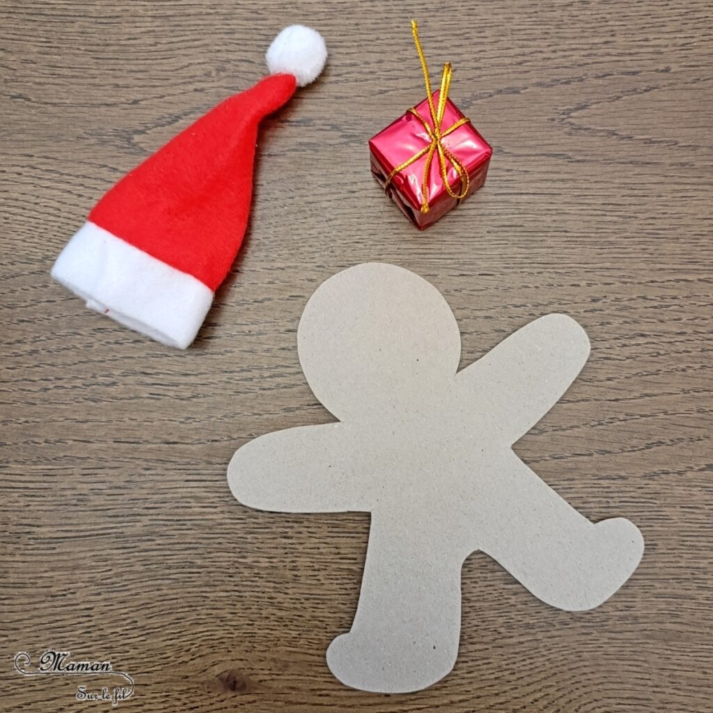 Fabriquer un bonhomme en pain d'épices en récup' avec son petit cadeau dans les bras : activité créative, récup' et manuelle enfants - Bricolage et décoration en carton - Découpage, dessin, graphismes, bonnet de Noël - Suspension DIY pour le sapin -Fait Maison - Thème Noël, hiver, gourmandises - Bricolage et décoration sympa et facile - Arts visuels Maternelle et cycle 2 - Maternelle et élémentaire - Créativité - Cycle 1 ou 2 - tutoriel photos - mslf