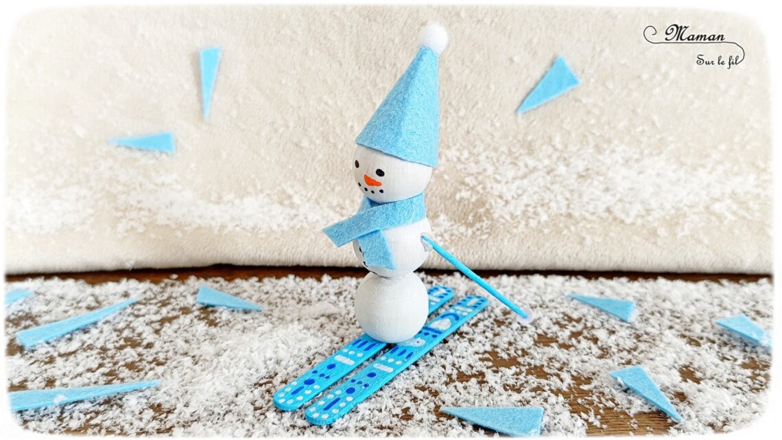 Fabriquer un bonhomme de neige qui fait du ski : activité créative et manuelle enfants - Bricolage avec des perles, des bâtonnets de glace en bois et de la feutrine - Récup, recyclage, surcyclage - Décoration hivernale - Thème hiver, montagne, neige, sports d'hiver - Bricolage et décoration sympa et facile - Arts visuels Maternelle et cycle 2 - Maternelle et élémentaire - Créativité - Cycle 1 ou 2 - tutoriel photos - mslf