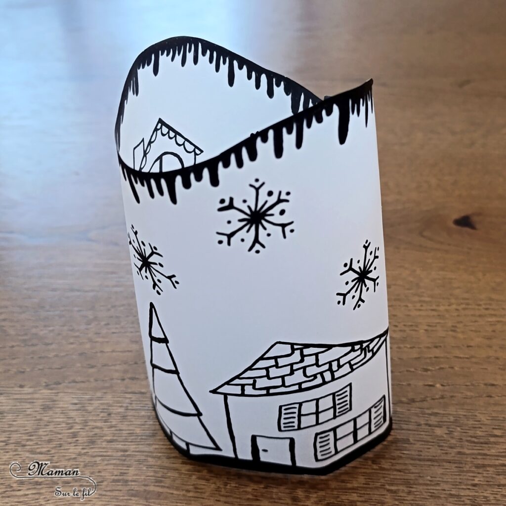 Fabriquer des lanternes hivernales avec du papier calque : activité créative, dessin et manuelle enfants - Dessiner un village d'hiver sur le calque (maisons, sapins, flocons, neige qui fond) en noir - Bougies LED pour le côté lumineux et cocooning - Décoration fait maison - Bricolage DIY - Thème hiver, neige - Bricolage et décoration sympa et facile - Arts visuels Maternelle et cycle 2 - Maternelle et élémentaire - Créativité - Cycle 1 ou 2 - tutoriel photos et vidéo - mslf