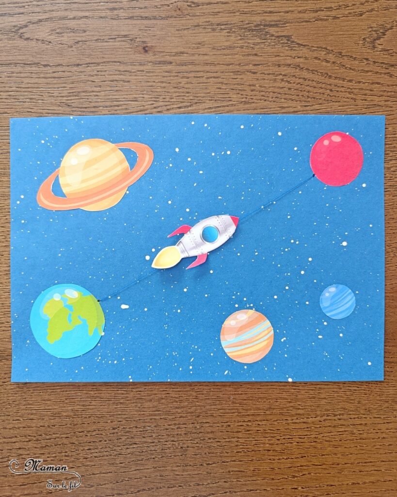 Fabriquer une fusée qui décolle et coulisse vers Mars : activité créative et manuelle enfants - Bricolage facile et rigolo avec un fil - Peinture éclaboussée avec un pinceau pour le fond étoilé - Découpage collage de planète - Fusée scotchée sur un fil - Thème Nuit, étoiles, espace et planètes - Bricolage et décoration sympa et facile - Arts visuels Maternelle et cycle 2 - Maternelle et élémentaire - Créativité - Cycle 1 ou 2 - tutoriel photos et vidéo - mslf