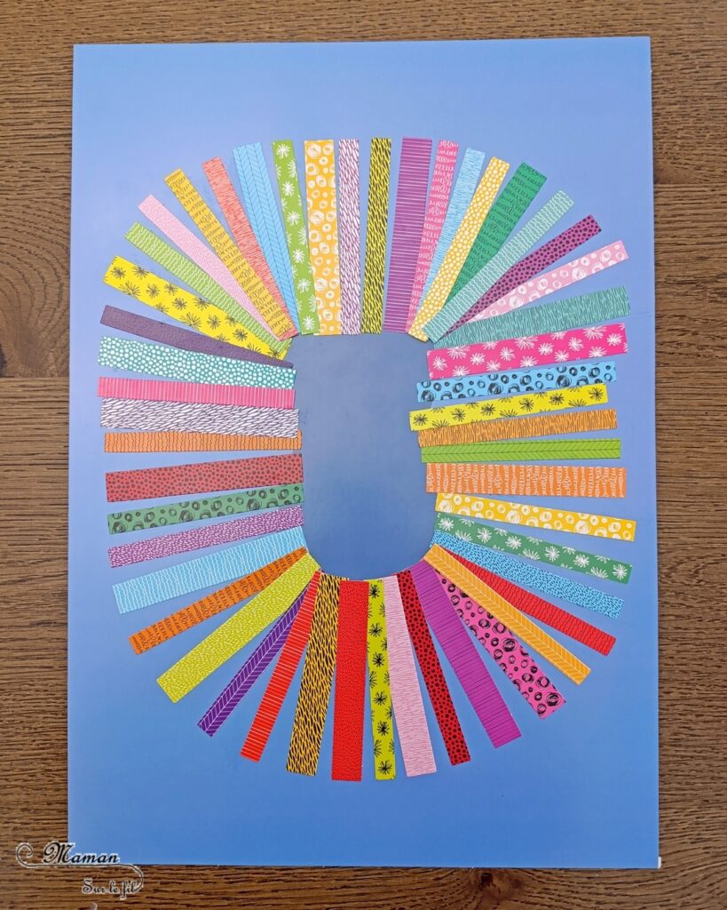 Créer un lion à la crinière colorée avec des bandes de papier : activité créative et manuelle enfants - Le tutoriel et tout le matériel viennent de chez 10 Doigts - Bricolage et décoration DIY réalisé avec des bandes de papier coloré et à motifs et des feuilles en papier cartonnée - Collage - Bricolage Fait maison, décoration - Kit tout compris - Thème Animaux de la savane, Carnaval, été - Bricolage sympa et facile - Arts visuels Maternelle et cycle 2 - Maternelle et élémentaire - Créativité - Cycle 1 ou 2 - tutoriel photos - mslf