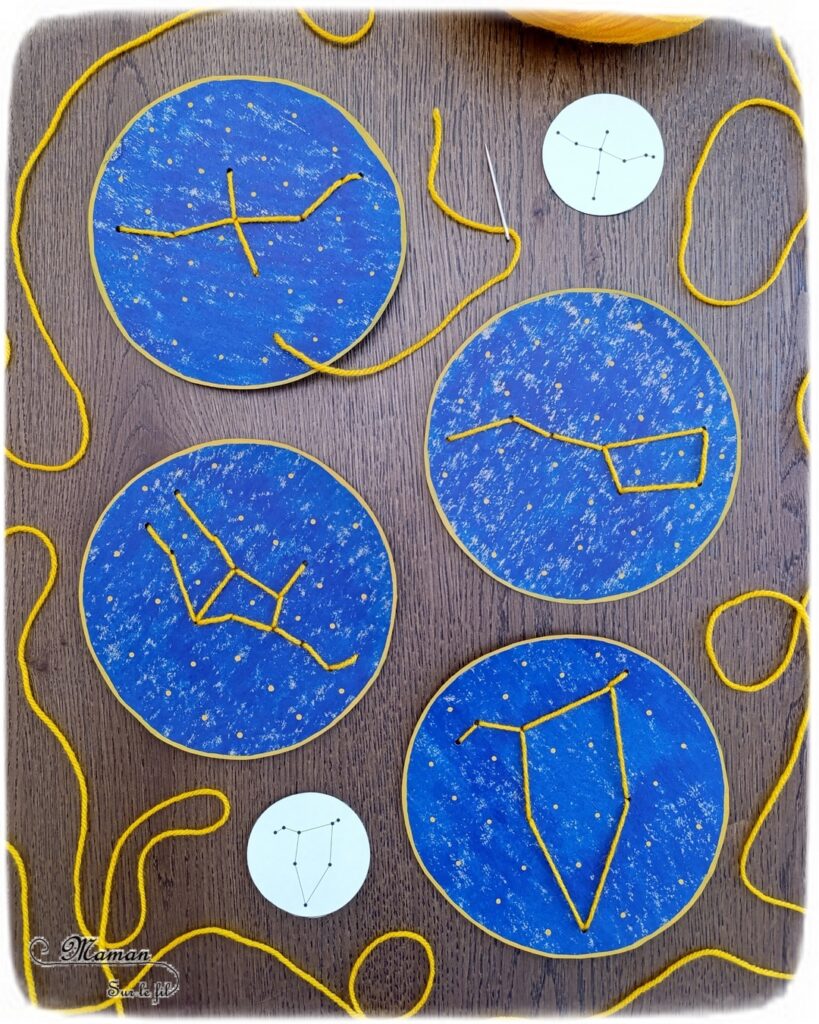 Broder des constellations avec de la laine et du carton : activité créative, récup' et manuelle enfants - Cercles en carton de récup' peint en bleu - Recyclage, surcyclage - Peinture, compas, géométrie, découpage - Trous dans le carton à la perforatrice - Reproduire les constellations avec un modèles avec de la laine et une aiguille - Initiation à la broderie, à la couture Motricité fine - Thème nuit, étoiles, espace - Bricolage et décoration sympa et facile - Arts visuels Maternelle et cycle 2 - Maternelle et élémentaire - Créativité - Cycle 1 ou 2 - tutoriel photos - mslf