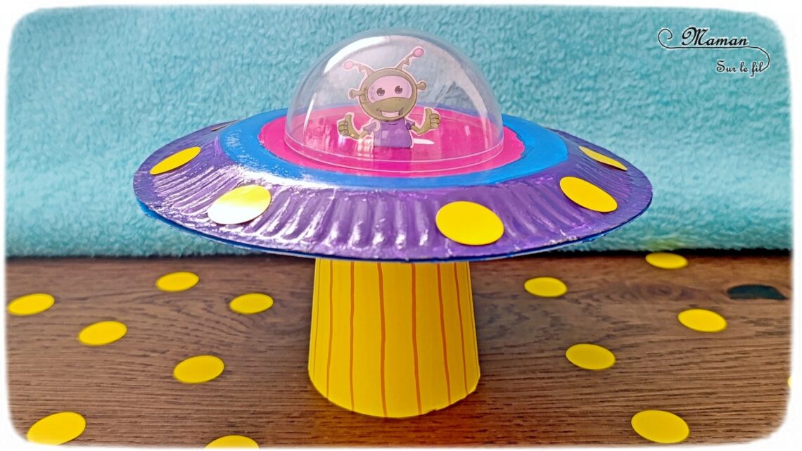 Fabriquer une soucoupe volante et son extraterrestre : activité créative, récup' et manuelle enfants - Vaisseau spatiale avec des assiettes en carton - Peinture et gommettes - Faisceau lumineux avec gobelet en carton jaune - Hublot avec une demi boule de noël transparente - Dessin de martien - Recyclage, surcyclage - Thème nuit, étoiles, espace, planètes - Bricolage et décoration sympa et facile - Arts visuels Maternelle et cycle 2 - Maternelle et élémentaire - Créativité - Cycle 1 ou 2 - tutoriel photos - mslf